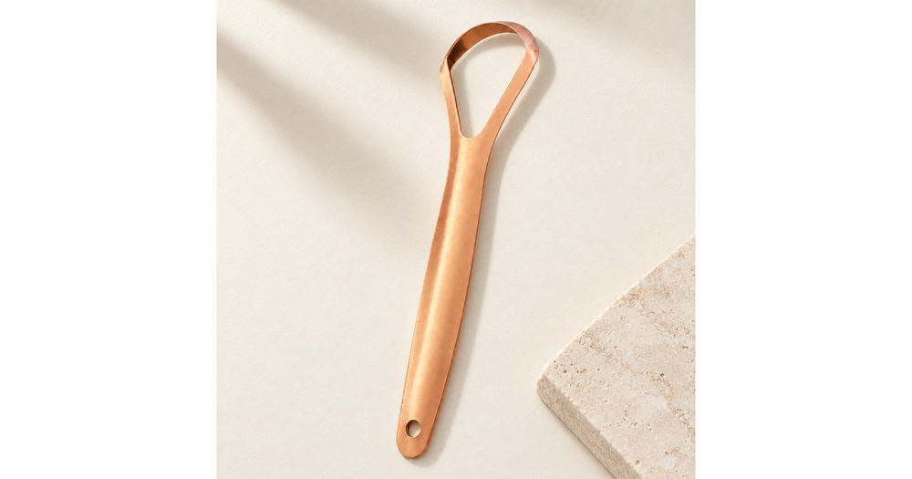 One-piece copper tongue scraper