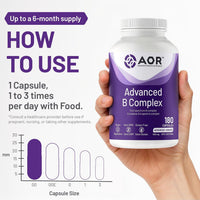 Professional setting showing a focused professional taking an AOR Activated B Complex capsule to maintain cognitive clarity and energy