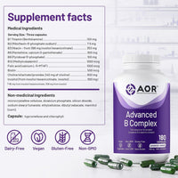 Professional setting showing a focused professional taking an AOR Activated B Complex capsule to maintain cognitive clarity and energy